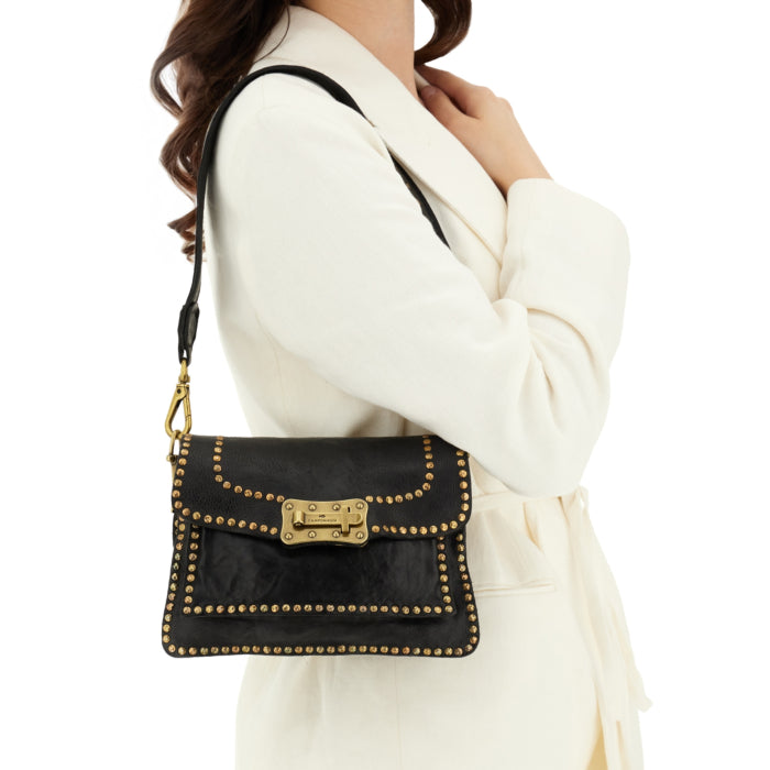 Agnese Cross-body bag in black garment-dyed cowhide leather with rivets
