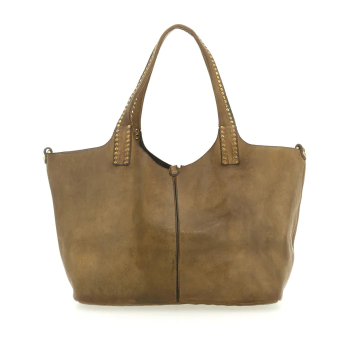 Kura Shopping bag in Ruggine leather with rivets