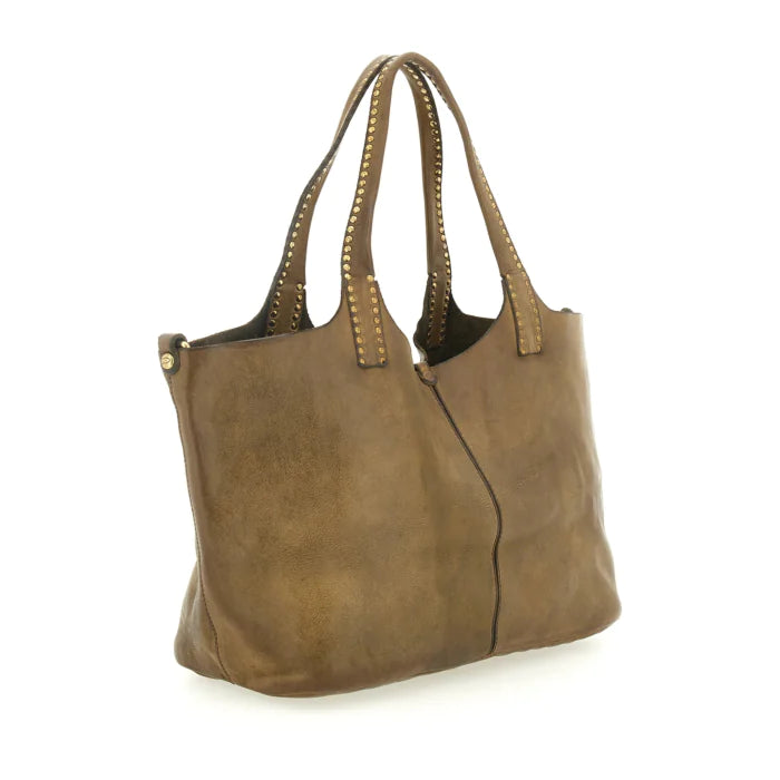 Kura Shopping bag in Ruggine leather with rivets