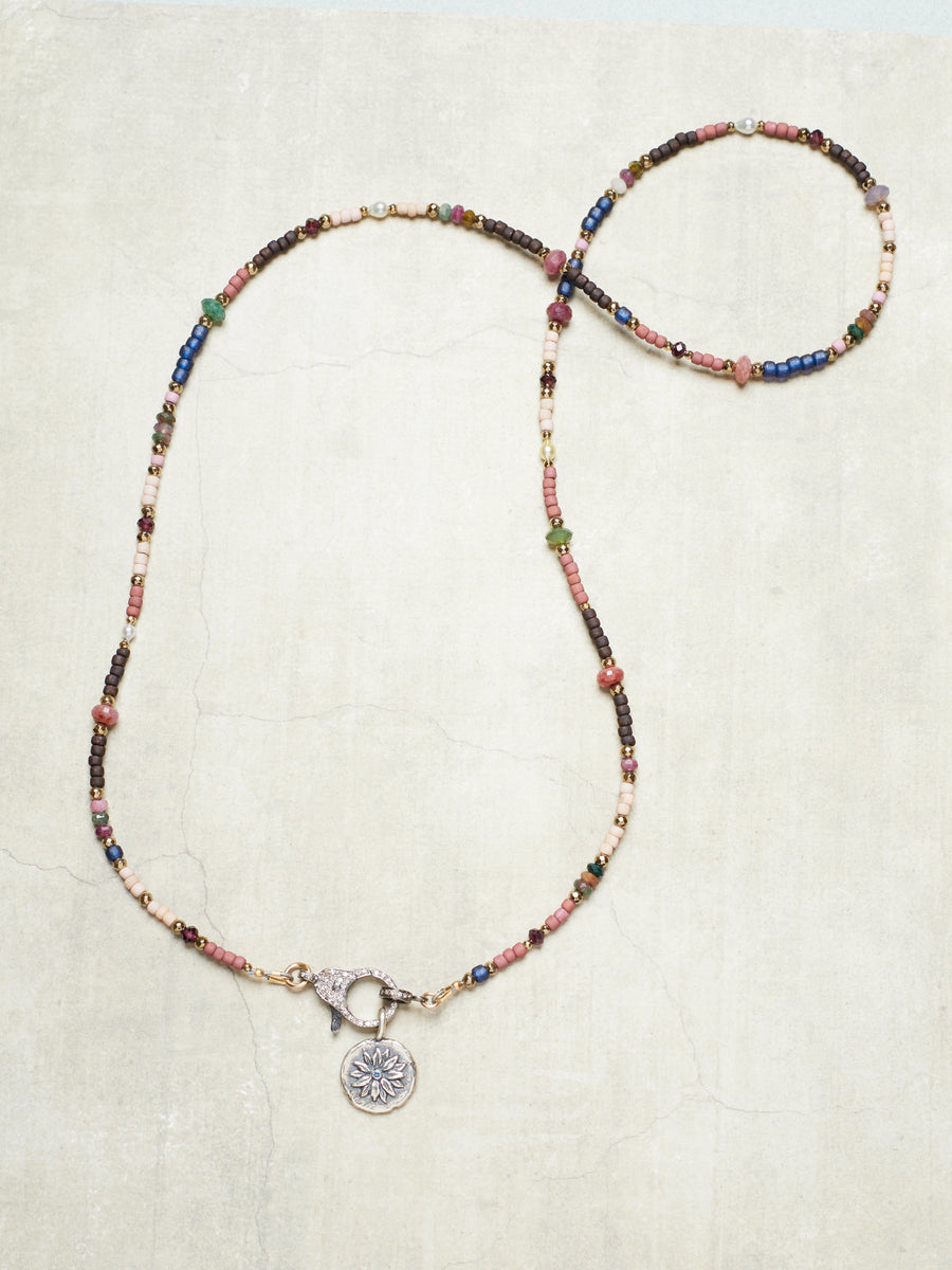 Priscilla necklace with loving awareness heart