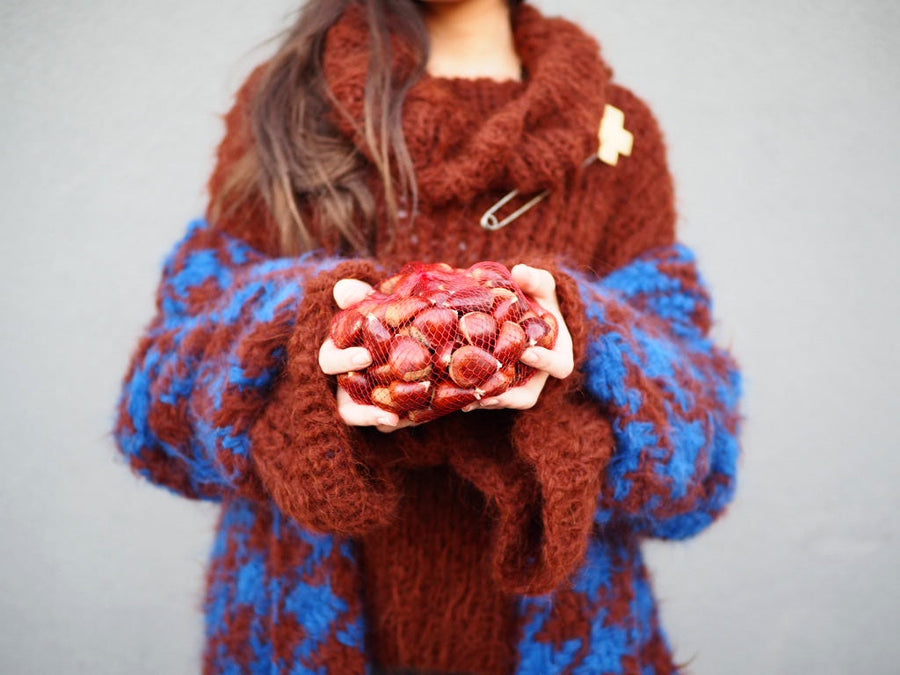 Chunky hand knit sweater with funnel collar