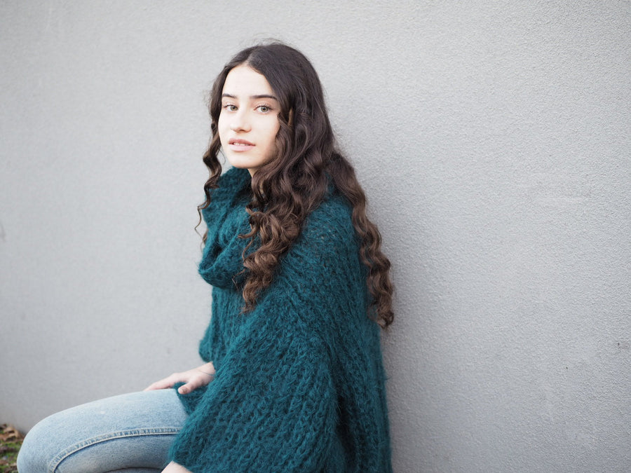 Chunky hand knit sweater with funnel collar