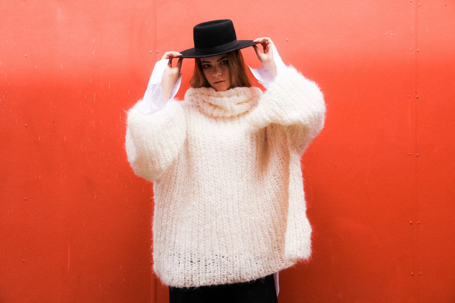 Chunky hand knit sweater with funnel collar