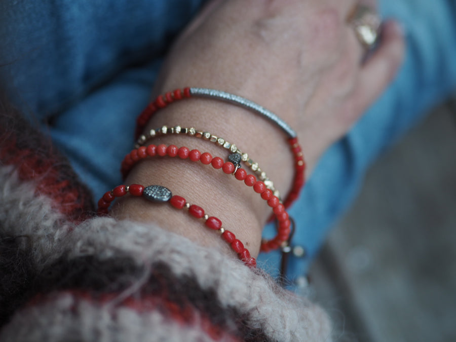 Coral stones bracelet with silver pave diamonds disk