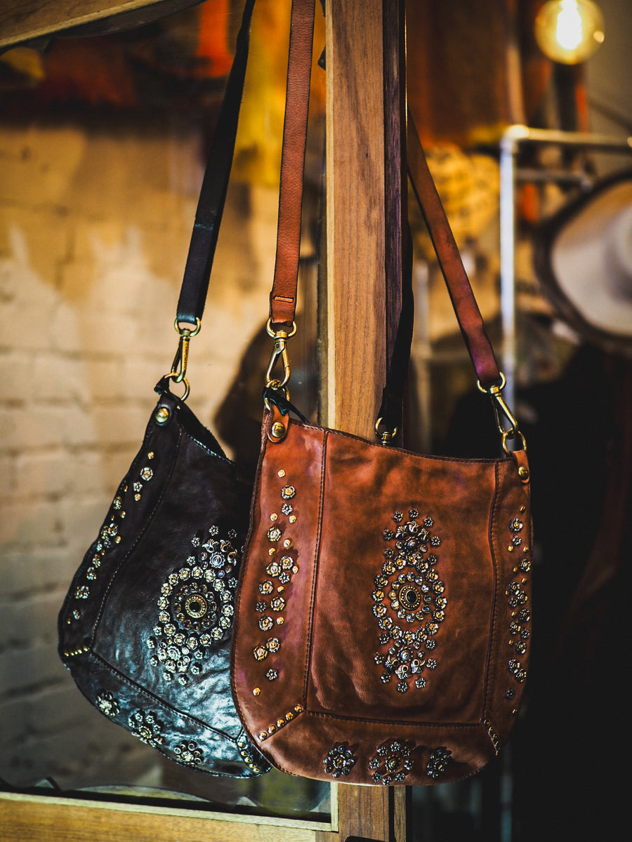Crossbody Bag Nora in garment-dyed cowhide leather with studs and rhinestones