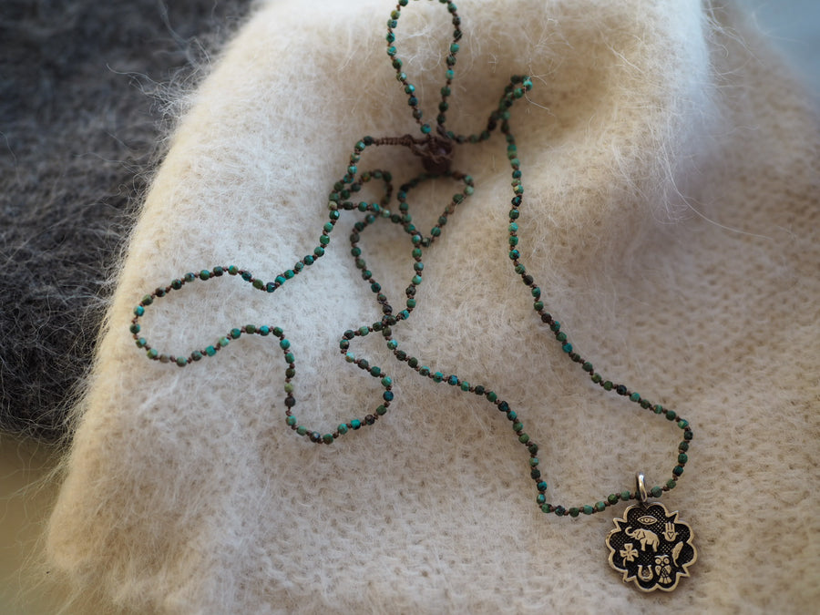Hand Knotted Turquoise Necklace With Sterling Silver Sacred Medallion Charm