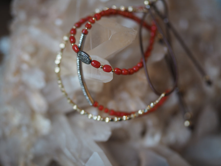 Coral stones bracelet with silver pave diamonds disk