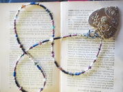 Priscilla necklace with loving awareness heart