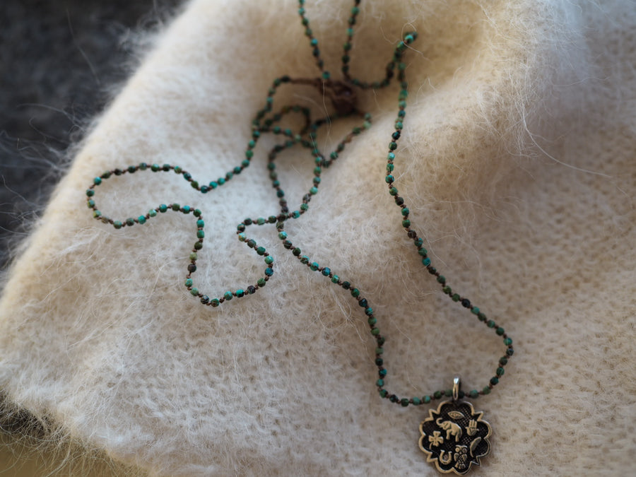 Hand Knotted Turquoise Necklace With Sterling Silver Sacred Medallion Charm