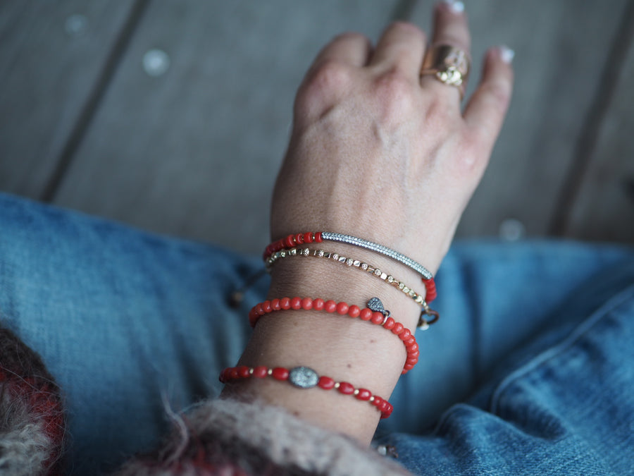 Coral stones bracelet with silver pave diamonds disk