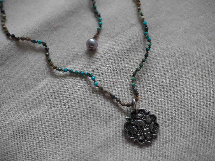 Hand Knotted Turquoise Necklace With Sterling Silver Sacred Medallion Charm