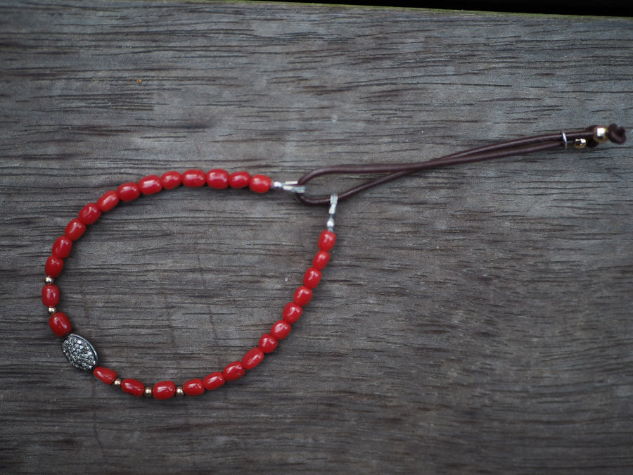 Coral stones bracelet with silver pave diamonds disk