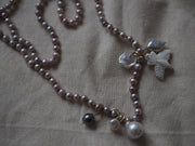 Pink Pearls With Hawk And Pearl Charms