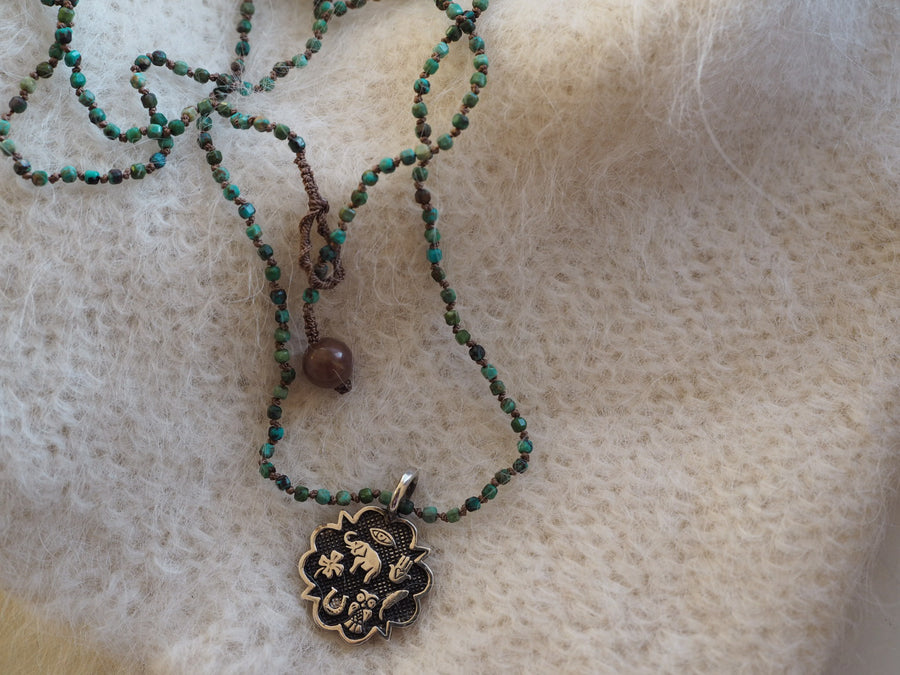 Hand Knotted Turquoise Necklace With Sterling Silver Sacred Medallion Charm