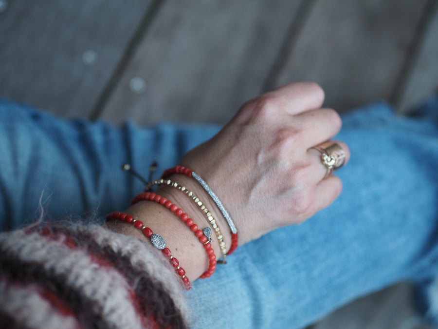 Coral stones bracelet with silver pave diamonds disk