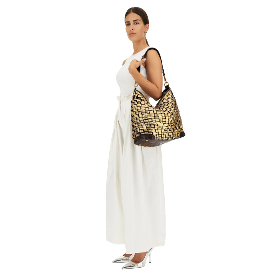Edera Lux
Shopping bag in laminated, woven and garment-dyed cowhide leather