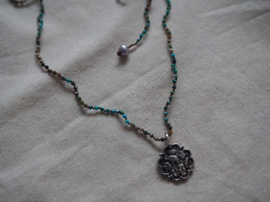 Hand Knotted Turquoise Necklace With Sterling Silver Sacred Medallion Charm