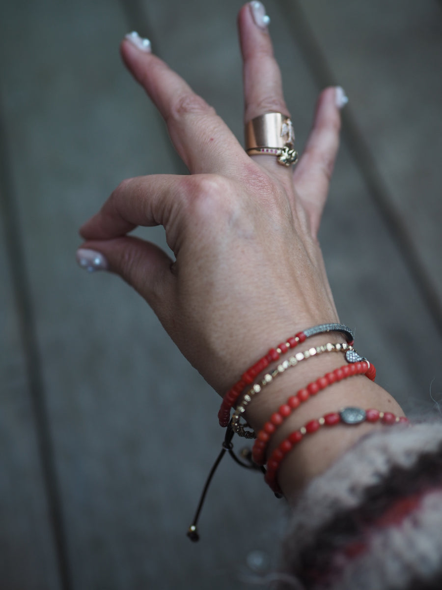 Coral stones bracelet with silver pave diamonds disk