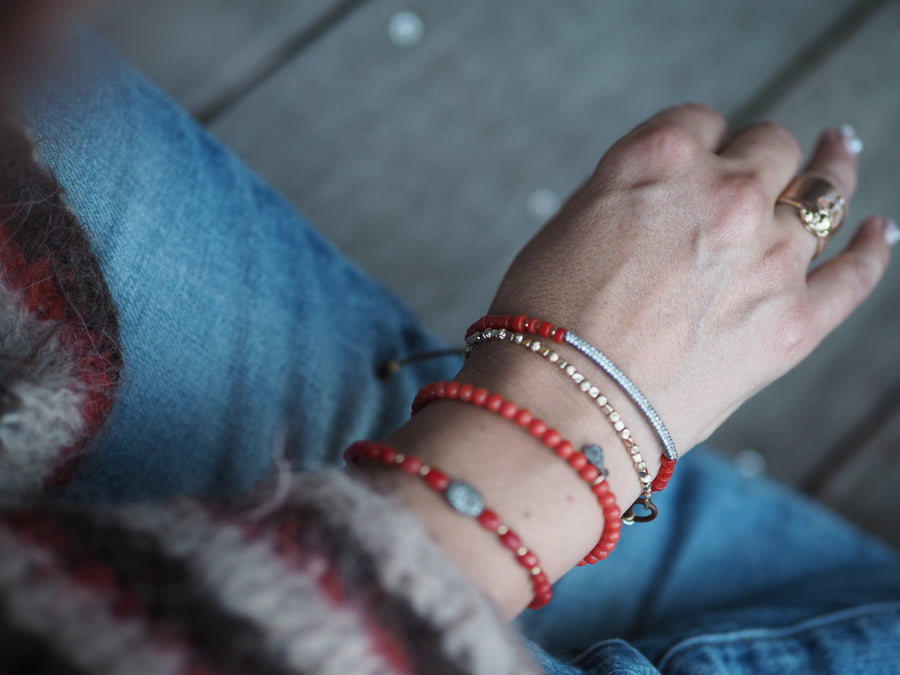 Coral stones bracelet with silver pave diamonds disk