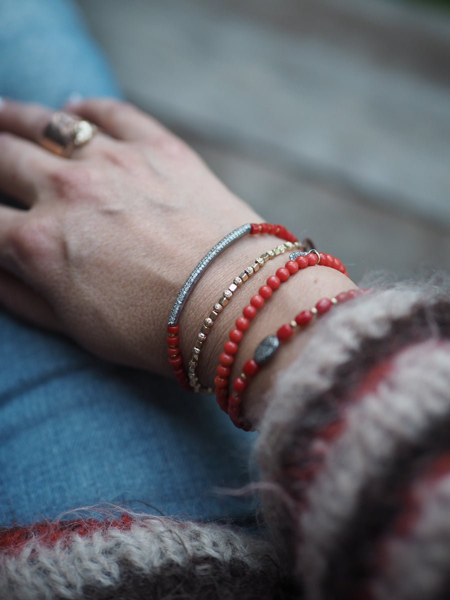 Coral stones bracelet with silver pave diamonds disk