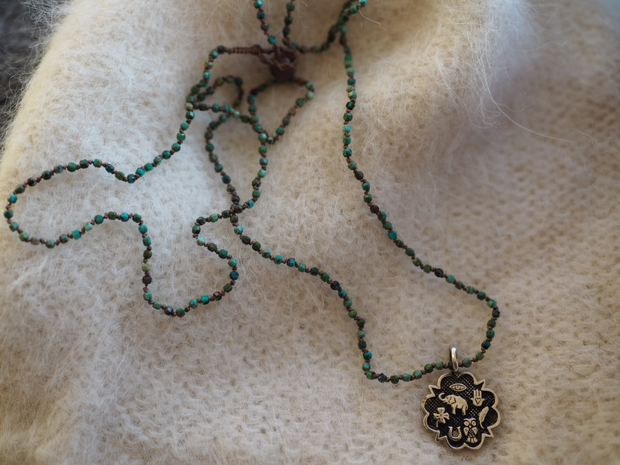 Hand Knotted Turquoise Necklace With Sterling Silver Sacred Medallion Charm