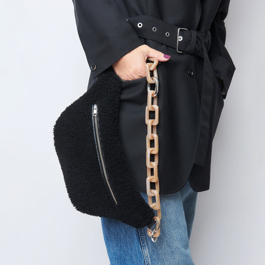 Model holding a Black Gabriele Frantzen Cosy Belt Bag