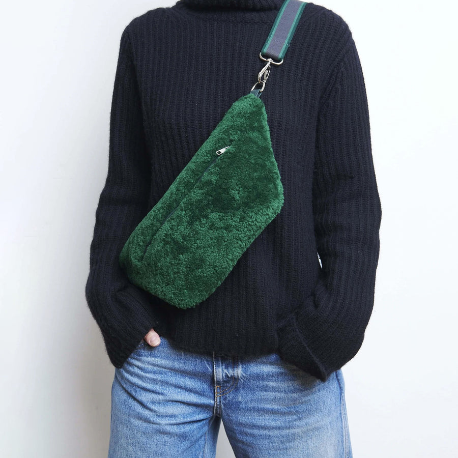 Model wearing a green Gabriele Frantzen Cosy Belt Bag