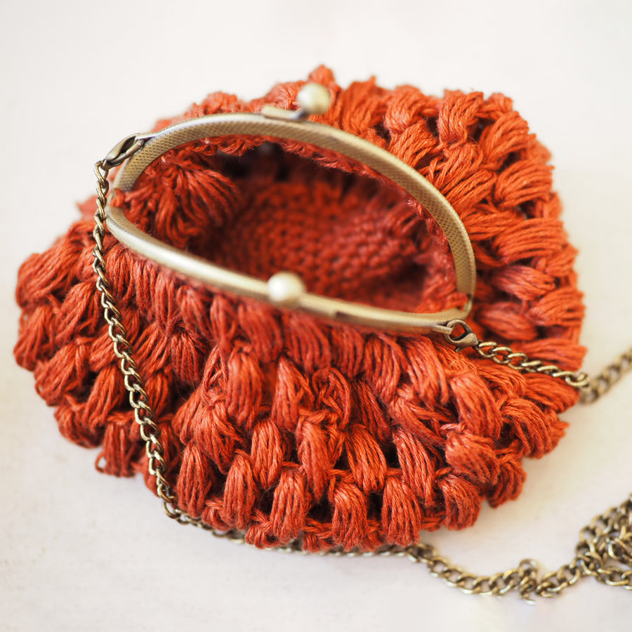 Close up of Terracotta Hand Crochet Linen Purse Mini from Amano by Lorena Laing