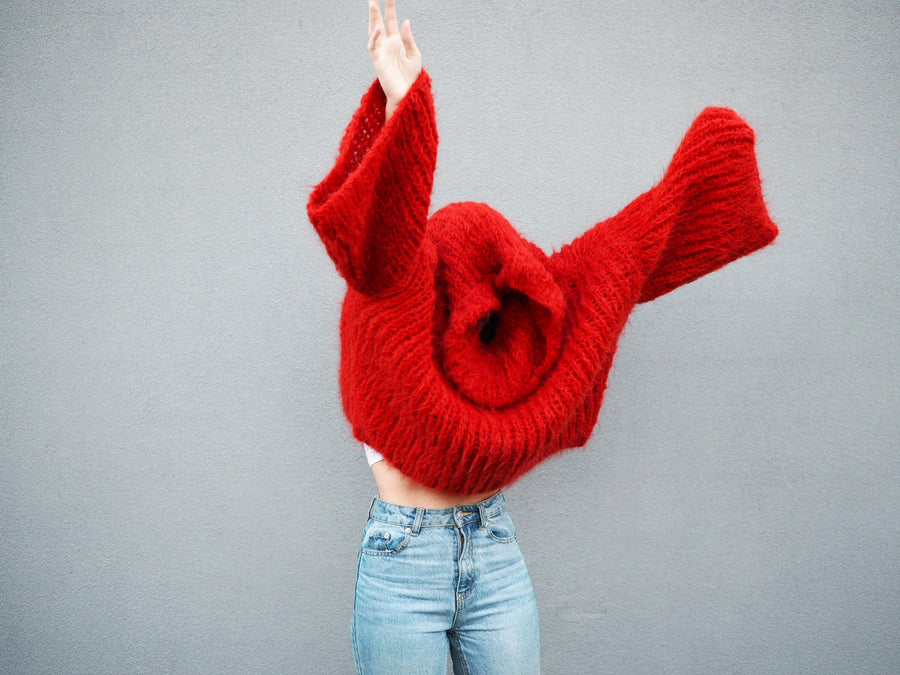 Chunky hand knit sweater with funnel collar