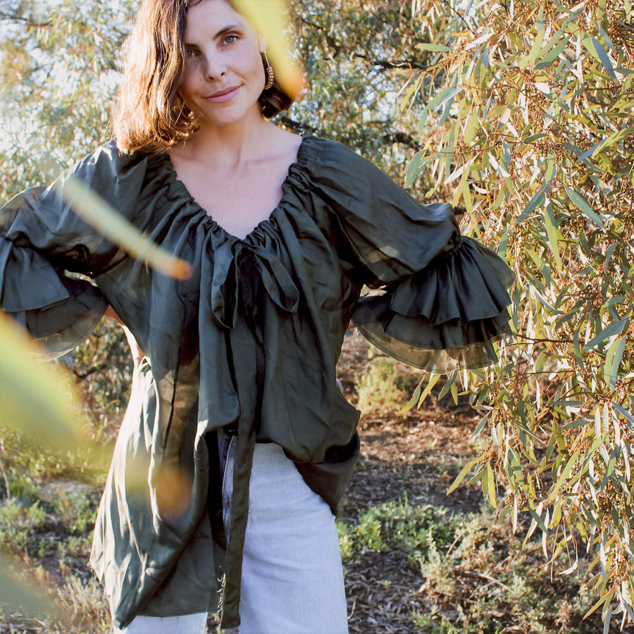 Model wearing a Khaki Button Back Blouse (Silk) | Amano by Lorena Laing