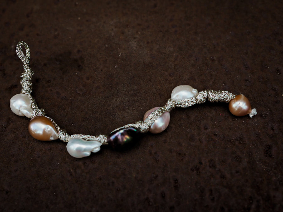 Mela pearl bracelet on metallic silk thread