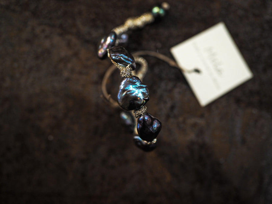 Mela pearl bracelet on metallic silk thread