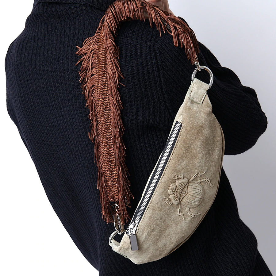 Model using a Gabriele Frantzen Short Brown Fringe Bag Strap