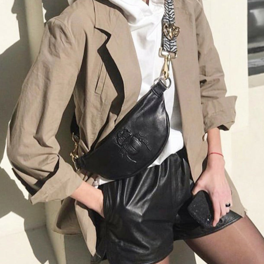 Model wearing a Gabriele Frantzen Black Scarab Belt Bag